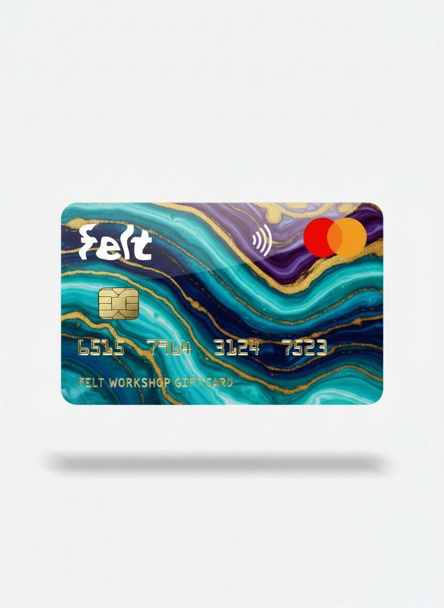 A digital representation of a gift card with a colorful design, including a Feit logo, a card number, and a Chip & PIN security code.