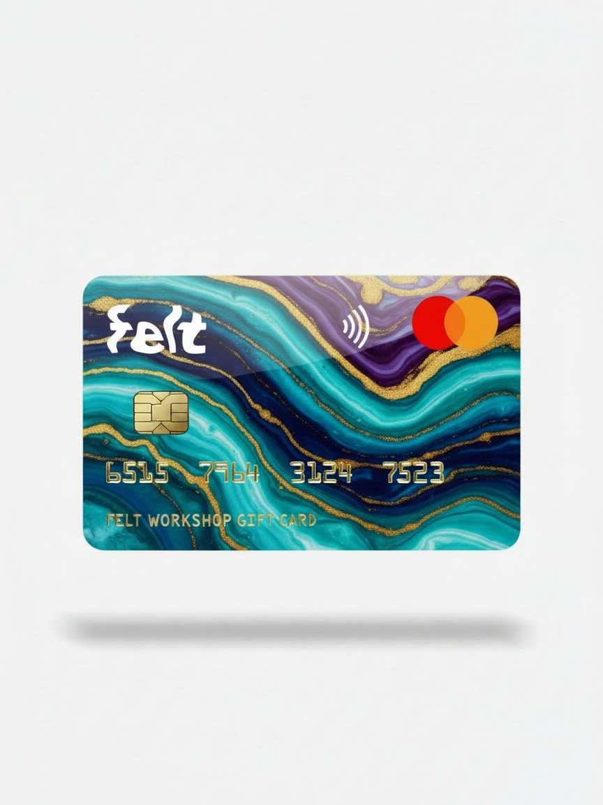A digital representation of a gift card with a colorful design, including a Feit logo, a card number, and a Chip & PIN security code.