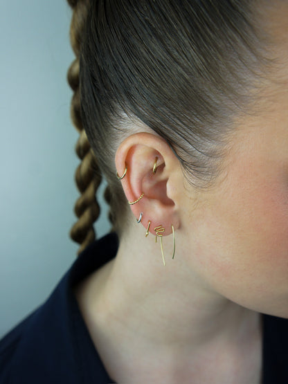 Felt Two AA gold earring
