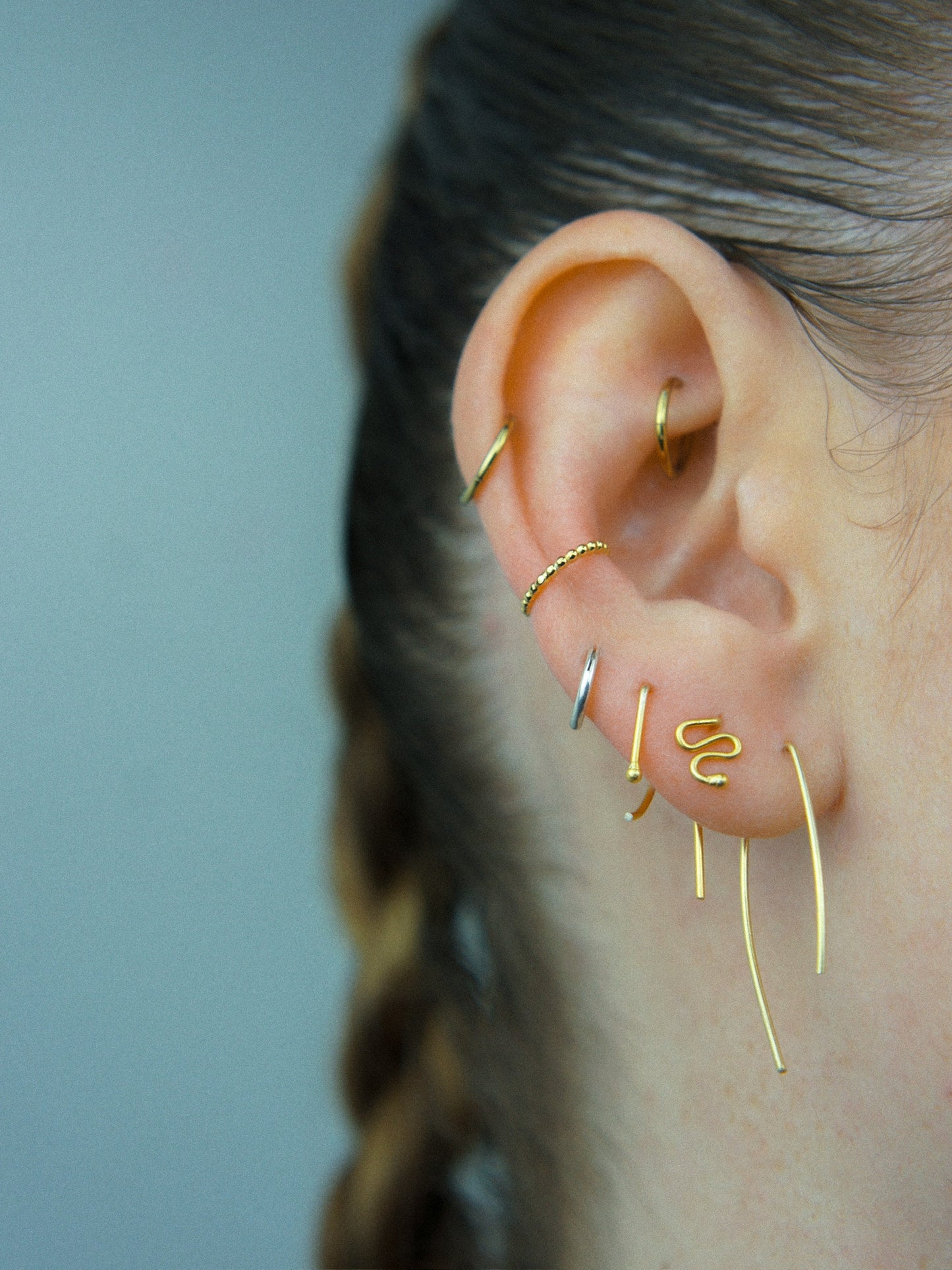 Felt Two AA gold earring